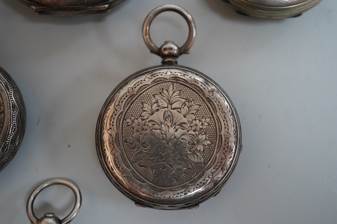 An early 20th century silver open faced pocket watch, with Arabic dial and subsidiary seconds, together with four other white metal open faced fob watches and a white metal half hunter pocket watch, case diameter 44mm.